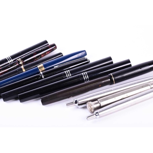 459 - A collection of pens and pencils, comprising: a Waterman's 'Ideal' 14ct nib fountain pen, three Osmi... 