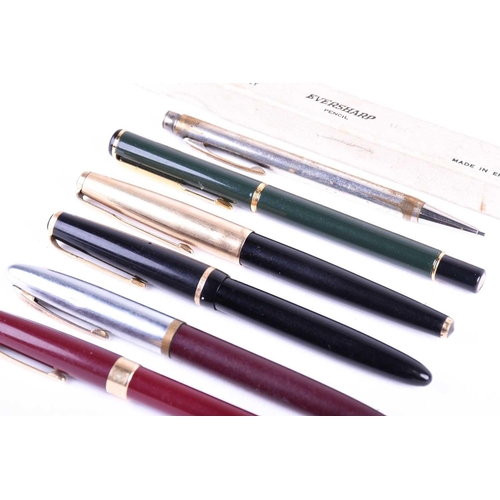 473 - A collection of pens, comprising a Parker Rolled Gold cap cartridge pen with 14K nib, a Parker ink s... 