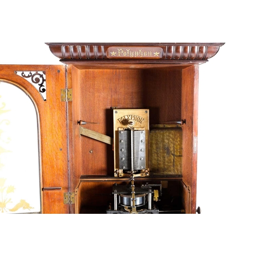 489 - An impressive Victorian mahogany 'Penny in the Slot' Polyphon on associated stand, the arched glazed... 