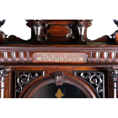 489 - An impressive Victorian mahogany 'Penny in the Slot' Polyphon on associated stand, the arched glazed... 