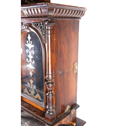 489 - An impressive Victorian mahogany 'Penny in the Slot' Polyphon on associated stand, the arched glazed... 