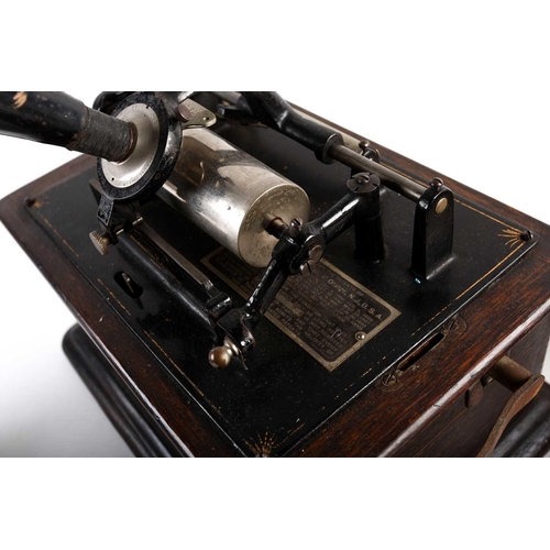 493 - An Edison Standard Phonograph, 1903, in oak case, with japanned and brass horn, the patent plate wit... 