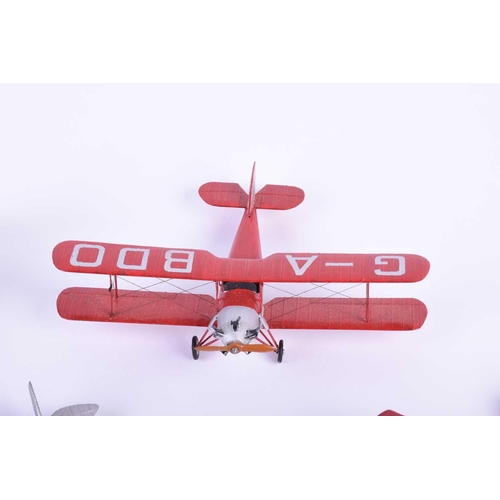 495 - A group of five W. O. Doylend miniature hardwood bi-planes, built to a scale of one inch to six feet... 