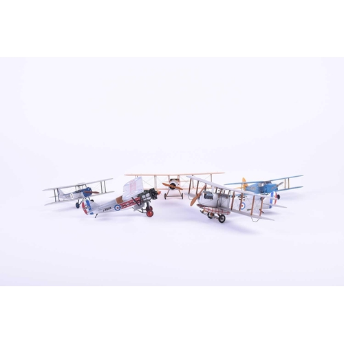 496 - A group of five W. O. Doylend miniature hardwood bi-planes, built to a scale of one inch to six feet... 