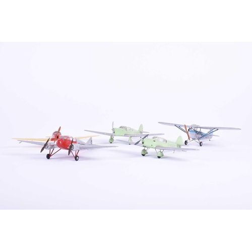 498 - A group of five W. O. Doylend miniature hardwood model airplanes, built to a scale of one inch to si... 