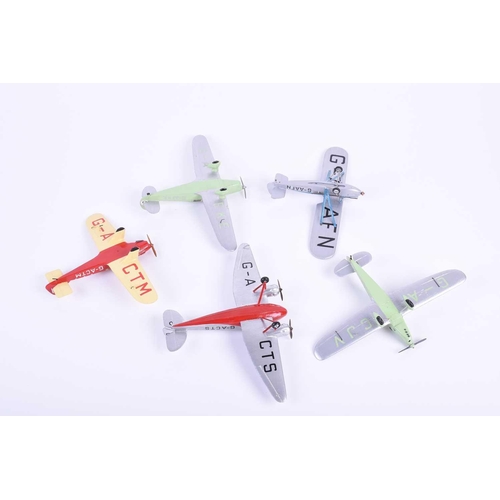 498 - A group of five W. O. Doylend miniature hardwood model airplanes, built to a scale of one inch to si... 