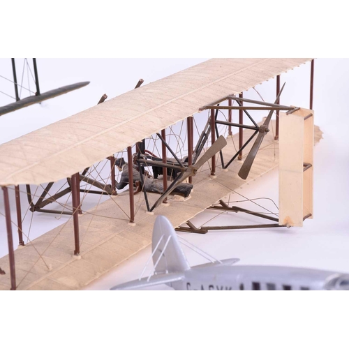 499 - Five W.O. Doylend miniature hardwood model airplanes, built to a scale of 1inch to six feet, each wi... 