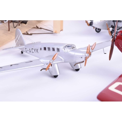 499 - Five W.O. Doylend miniature hardwood model airplanes, built to a scale of 1inch to six feet, each wi... 