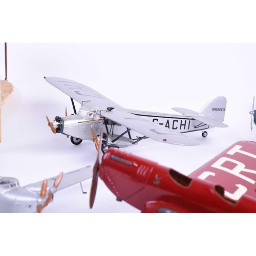 499 - Five W.O. Doylend miniature hardwood model airplanes, built to a scale of 1inch to six feet, each wi... 