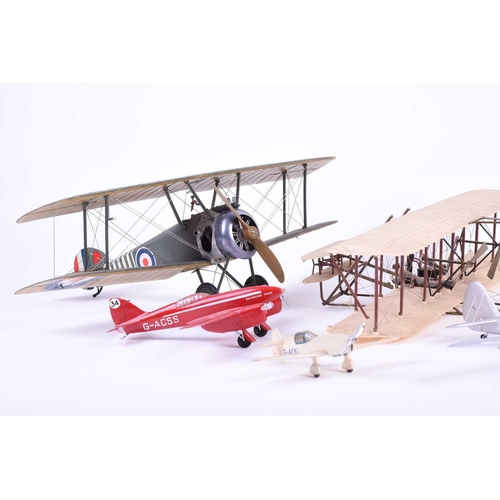 499 - Five W.O. Doylend miniature hardwood model airplanes, built to a scale of 1inch to six feet, each wi... 