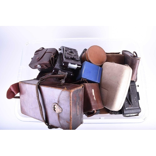 501 - A collection of vintage cameras, to include a London Stereoscopic Co 'The Service', in leather case,... 