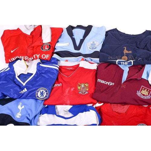 519 - A large collection of official club football shirts, polo shirts and jackets, adult sizes from vario... 