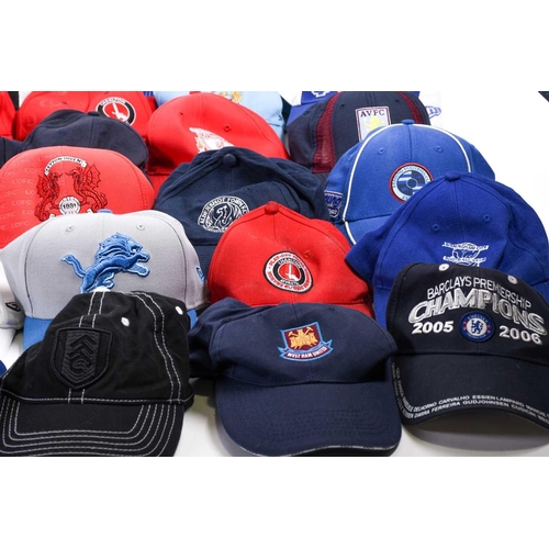 520 - A large collection of official club-issued football caps and scarves, to include examples from Liver... 