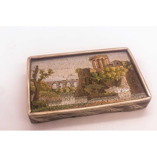 527 - A 19th century micro mosaic desk ornament, the retangular plaque depiciting a Classical Roman villa ... 