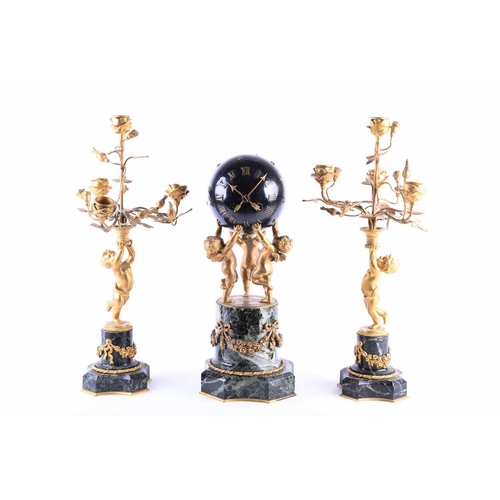 529 - A French gilt metal and marble clock garniture, late 19th century, the clock as a celestial sphere w... 