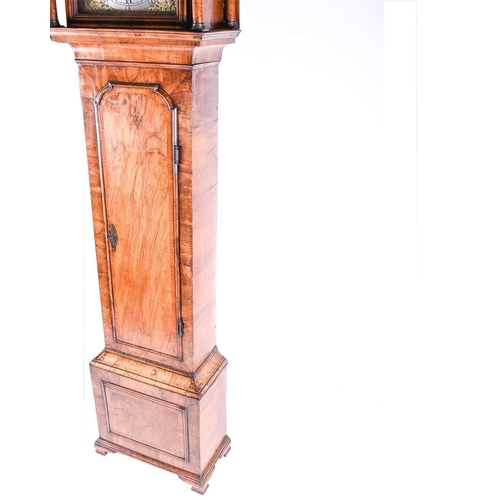 530 - A Georgian walnut long case clock, the arched brass dial for Richard Holland, Coventry, with silvere... 