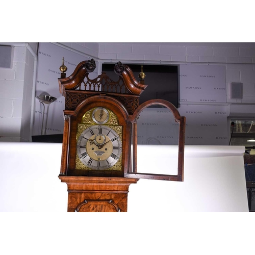 530 - A Georgian walnut long case clock, the arched brass dial for Richard Holland, Coventry, with silvere... 