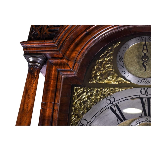 530 - A Georgian walnut long case clock, the arched brass dial for Richard Holland, Coventry, with silvere... 