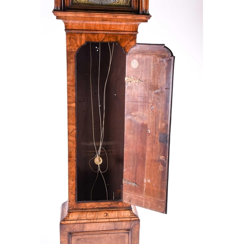 530 - A Georgian walnut long case clock, the arched brass dial for Richard Holland, Coventry, with silvere... 