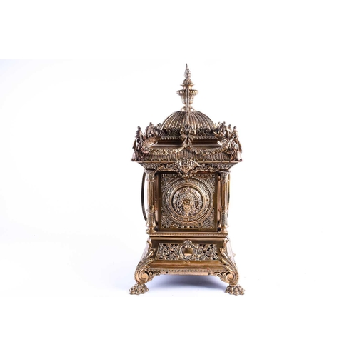 536 - A large and elaborate Victorian brass mantel clock, the dial with Roman numerals and with eight day ... 