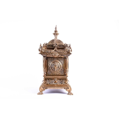 536 - A large and elaborate Victorian brass mantel clock, the dial with Roman numerals and with eight day ... 