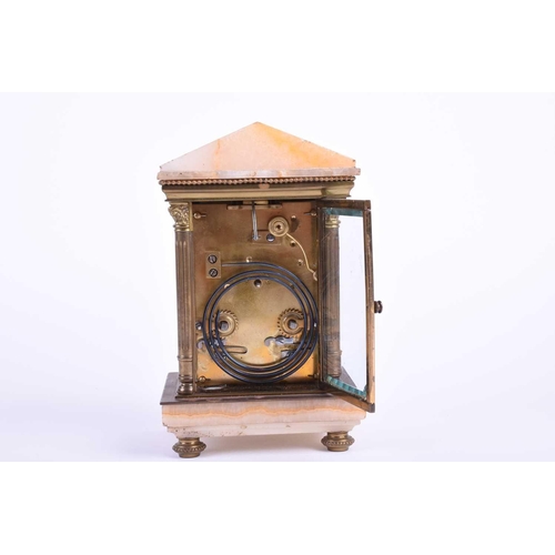 538 - A brass carriage clock, circa 1900, the enamel dial inscribed' Exd by Dent, 61 Strand, London', with... 