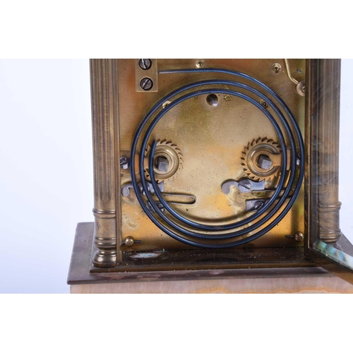 538 - A brass carriage clock, circa 1900, the enamel dial inscribed' Exd by Dent, 61 Strand, London', with... 