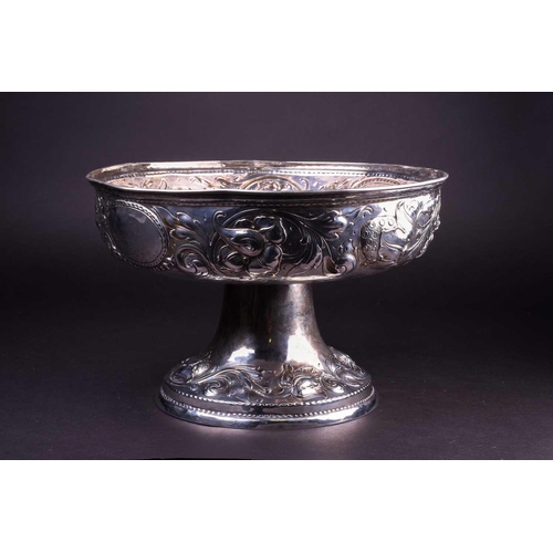 555 - A 19th century German silver centerpiece/fruit bowl, with repoussé foliate decoration on a circular ... 