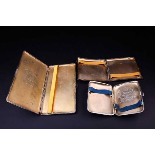 557 - A group of three silver cigarette cases, various dates and makers, the largest 15.7 cm x 9 cm, 13 oz... 