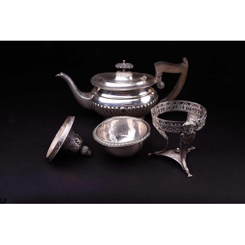 558 - A George V silver teapot, Sheffield 1912 by W. & E.V., 25.5 cm wide, together with a Continental whi... 