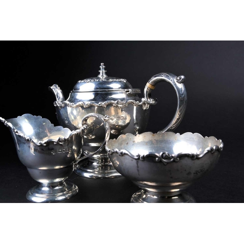 560 - An Edwardian three-piece silver bachelor's teaset, London 1901 by Horace Woodward & Co. Ltd, comprsi... 