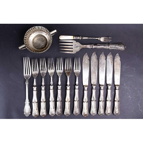 568 - A group of silver-handled flatware, together with a Continental silver plated twin-handled cup.