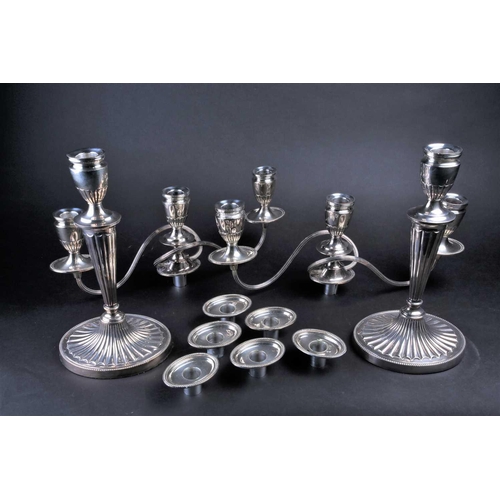 575 - A pair of large George III style silver plate on copper three branch candelabra, 20th century, 42cm