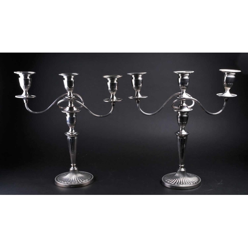 575 - A pair of large George III style silver plate on copper three branch candelabra, 20th century, 42cm