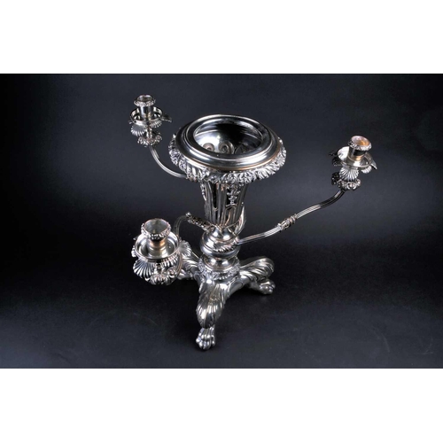 576 - A silver plated centerpiece/epergne, the vase with leafy scroll and shell rim above the pierced body... 