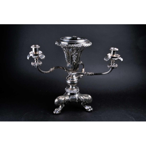 576 - A silver plated centerpiece/epergne, the vase with leafy scroll and shell rim above the pierced body... 