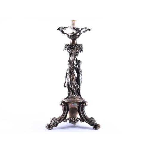 578 - An Victorian silver plated figural lamp of imposing proportions, with grape and vine decoration over... 