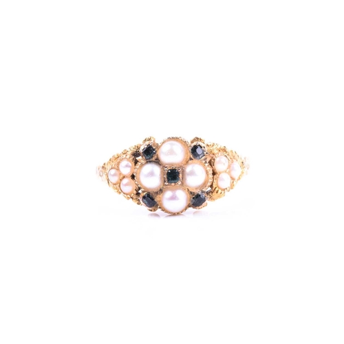 585 - An antique split pearl and green tourmaline cluster ring, the central cluster with threee stone spli... 