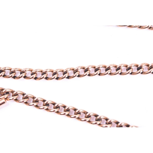 588 - A 9ct rose gold watch chain, the graduated curb pattern double Albert with sprung clasps and T bar, ... 