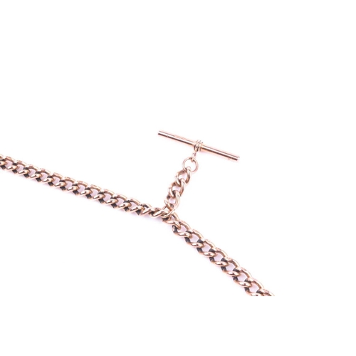 588 - A 9ct rose gold watch chain, the graduated curb pattern double Albert with sprung clasps and T bar, ... 