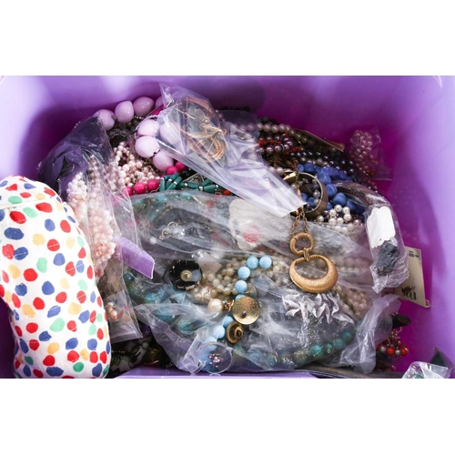 598 - A large quantity of costume jewellery, to include earrings, necklaces, bracelets and others.