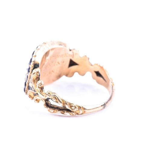 599 - A Georgian yellow gold mourning ring, with pearl and black stone decoration (a/f) with glass apertur... 