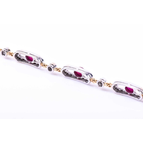 612 - An 18ct yellow gold, diamond, and ruby bracelet, the oval panels each collet-set with a cabochon rub... 