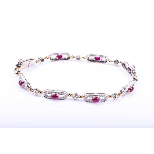 612 - An 18ct yellow gold, diamond, and ruby bracelet, the oval panels each collet-set with a cabochon rub... 