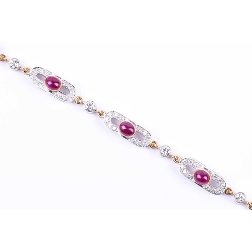 612 - An 18ct yellow gold, diamond, and ruby bracelet, the oval panels each collet-set with a cabochon rub... 