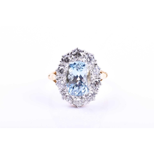 613 - An 18ct yellow gold, diamond, and aquamarine ring, set with a mixed rectangular cushion-cut aquamari... 