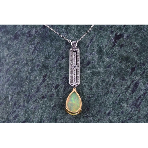 620 - A diamond and opal drop pendant necklace in the Art Deco style, set with a pear-shaped cabochon opal... 