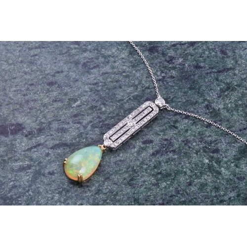 620 - A diamond and opal drop pendant necklace in the Art Deco style, set with a pear-shaped cabochon opal... 