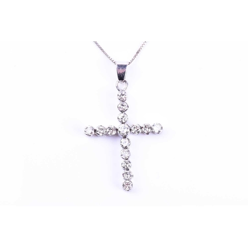 625 - A diamond cross pendant, set with fifteen round brilliant-cut diamonds of approximately 1.50 carats ... 