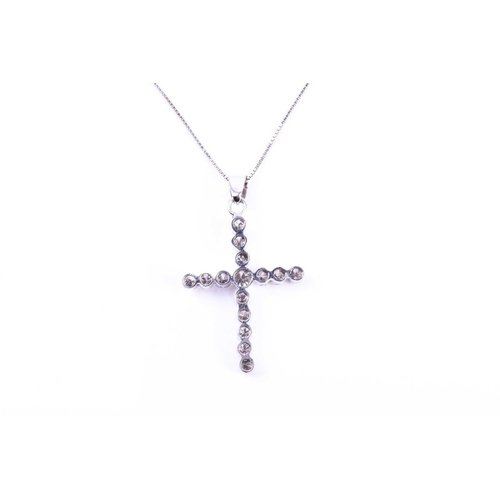 625 - A diamond cross pendant, set with fifteen round brilliant-cut diamonds of approximately 1.50 carats ... 